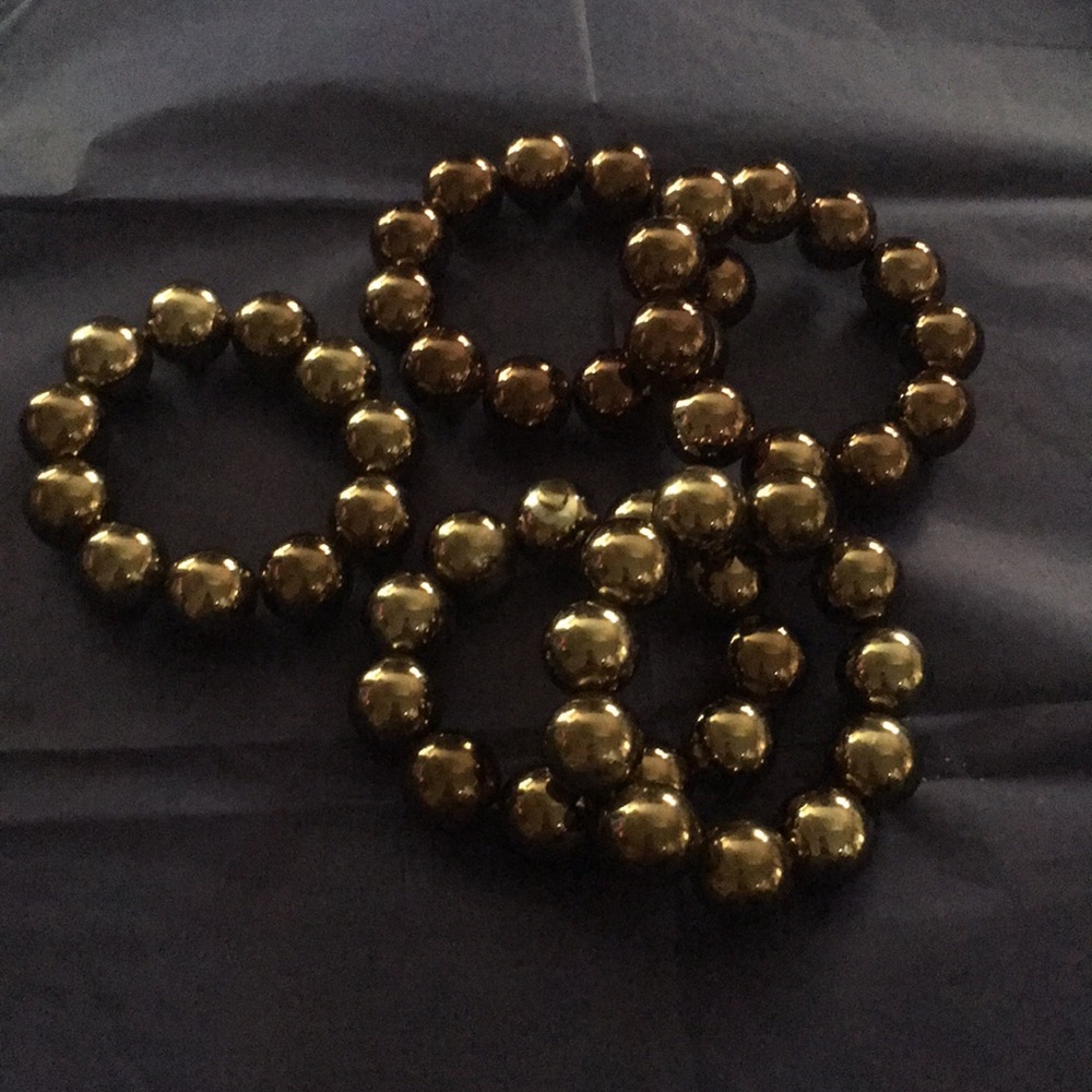 5 brown bracelets